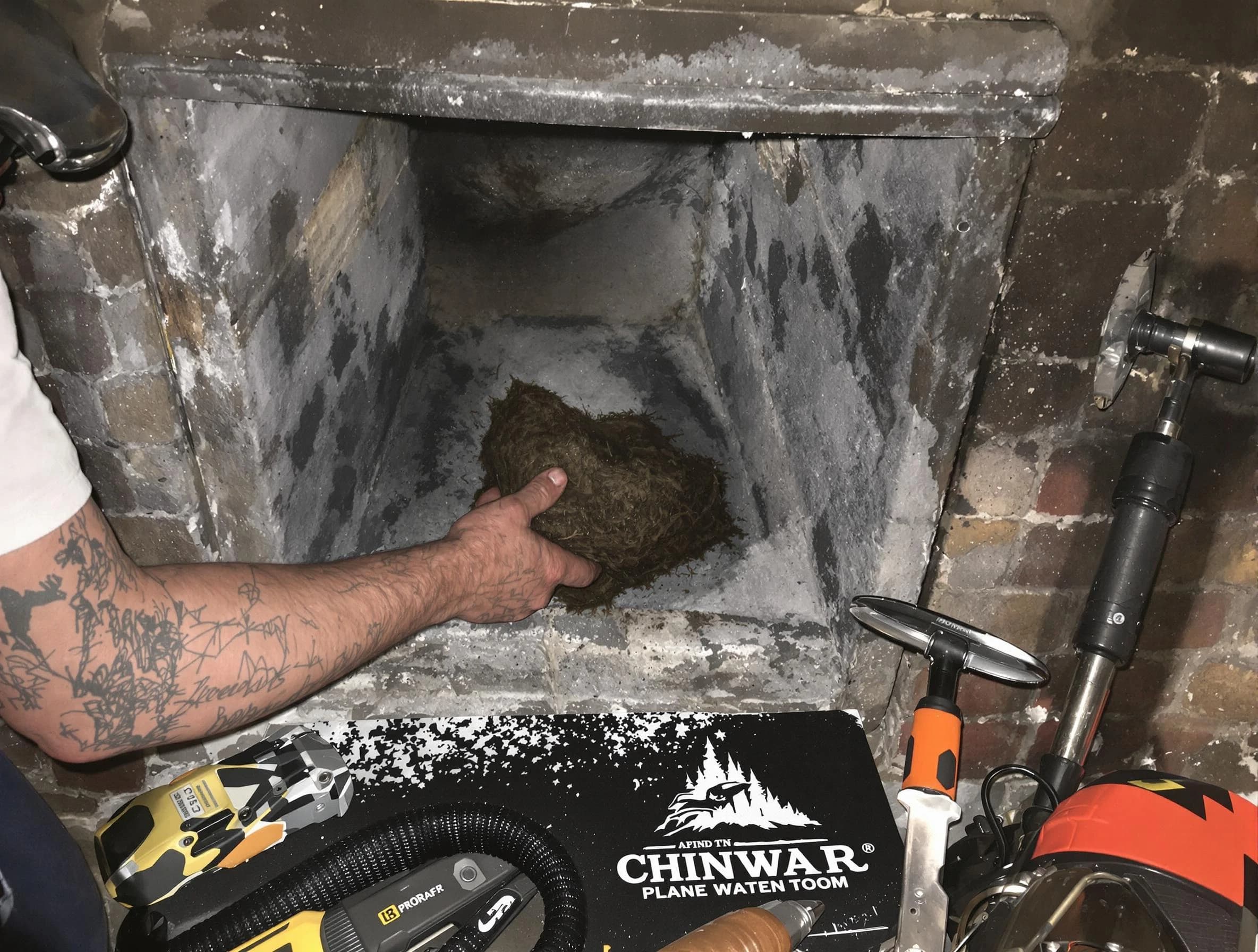 Chester Chimney Sweep safely removing debris and screening chimney in Chester, VA